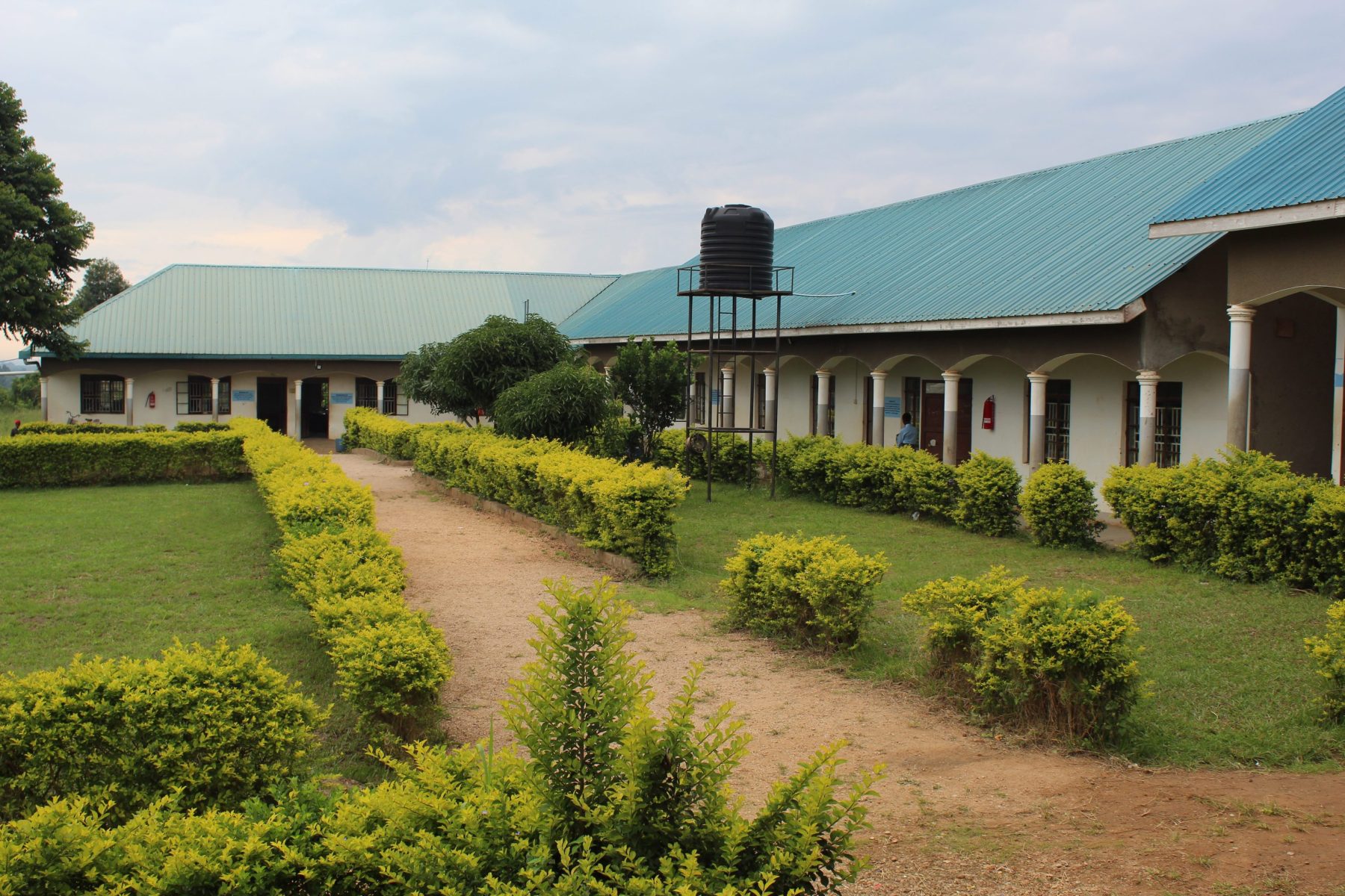 Eagles Wings Children's Village High now has its front yard beautifully landscaped with bushes and trees.
