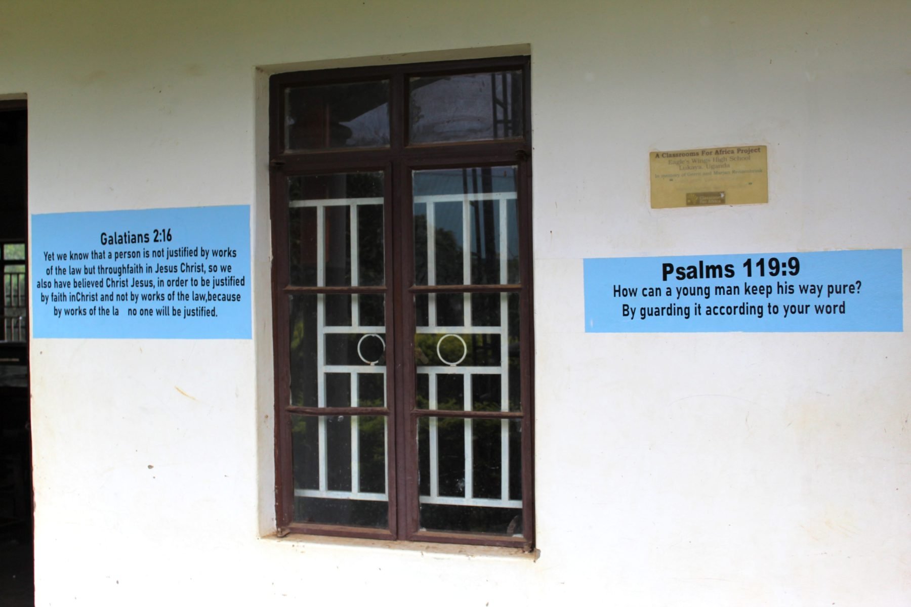 Bible verses teaching important truths adorn the front walls of Eagles Wings Children's Village High School.